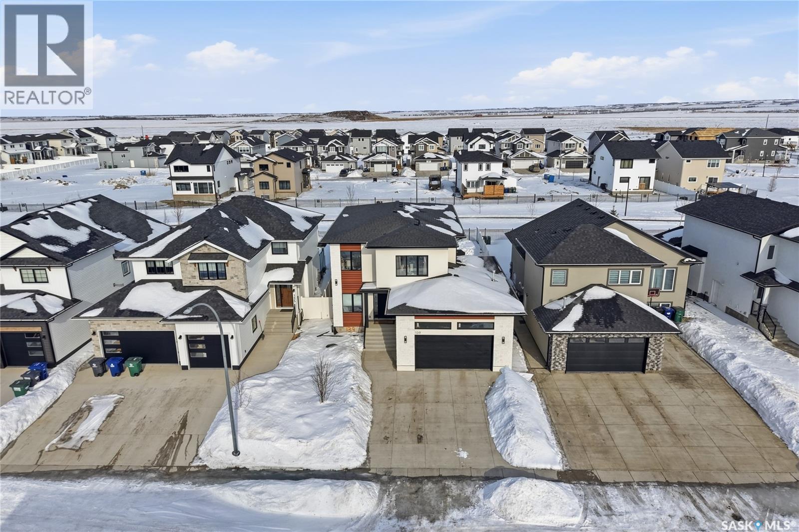 139 Woolf Bend, Saskatoon, SK - Outdoor With Facade