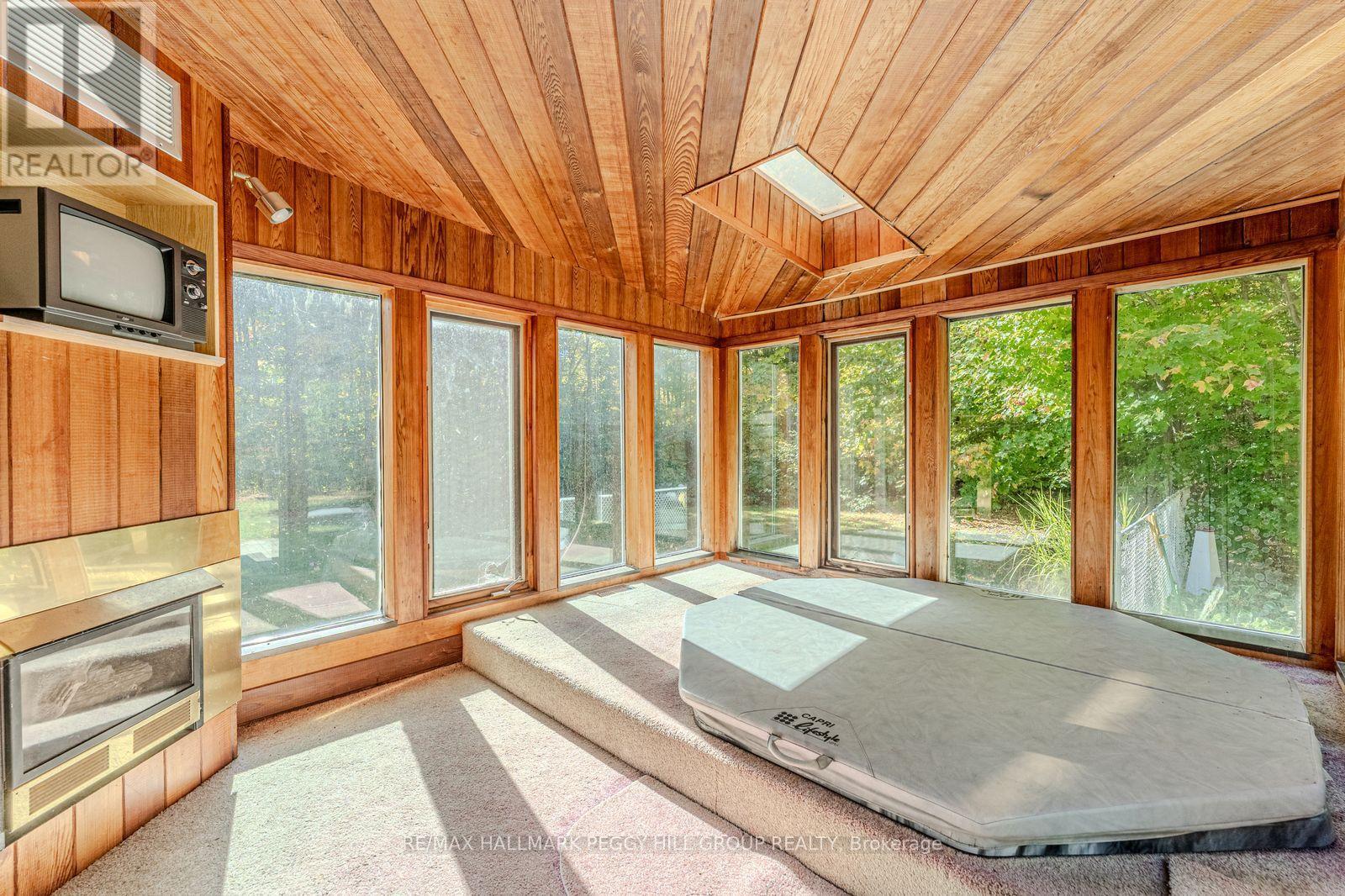 350 5 Concession W, Tiny, ON - Indoor Photo Showing Other Room With Fireplace