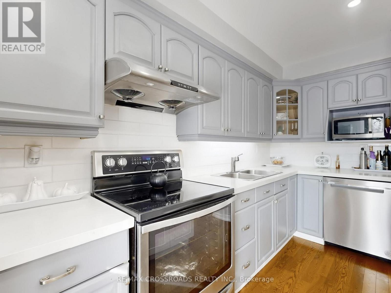 64 Sable Crescent, Whitby, ON - Indoor Photo Showing Kitchen With Double Sink
