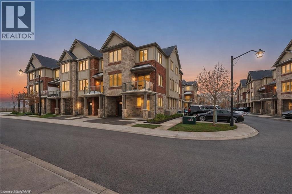 View of property at dusk - 4 Andruss Lane, Ancaster, ON - Outdoor With Facade
