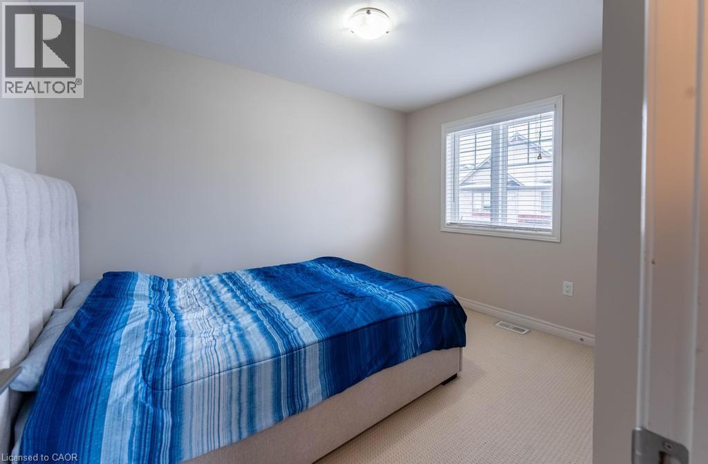 Bedroom featuring carpet floors and baseboards - 4 Andruss Lane, Ancaster, ON - Indoor Photo Showing Bedroom