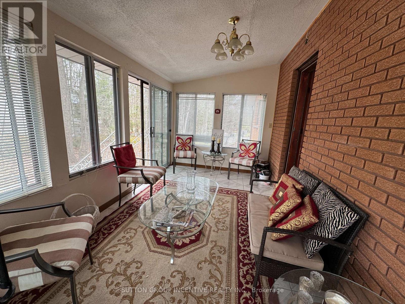 10 Celestine Court, Tiny, ON - Indoor Photo Showing Other Room With Fireplace