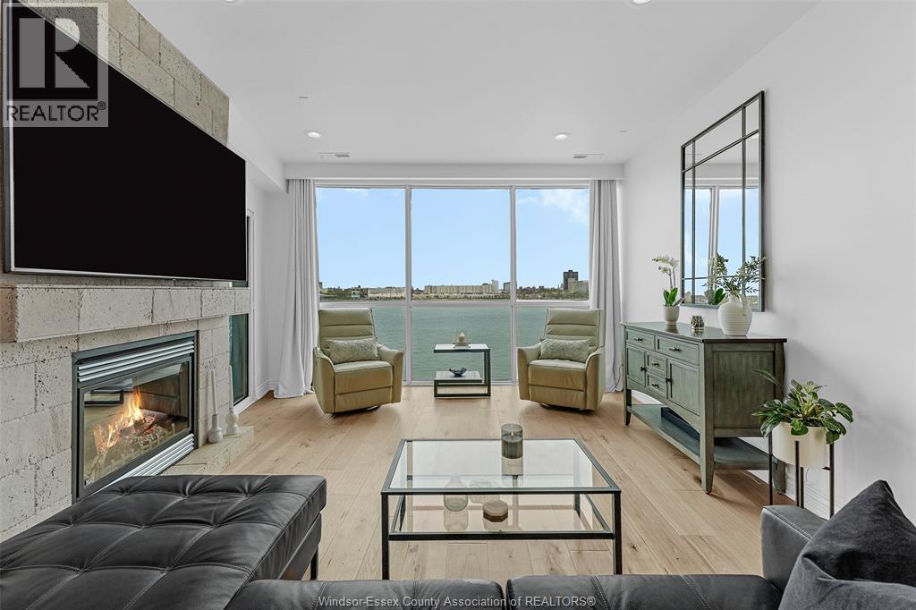 1225 Riverside Drive Unit# 404, Windsor, ON - Indoor Photo Showing Living Room With Fireplace