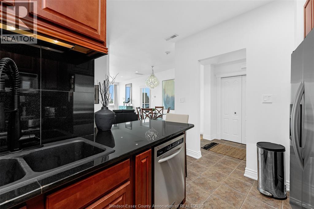 1225 Riverside Drive Unit# 404, Windsor, ON - Indoor Photo Showing Kitchen With Double Sink