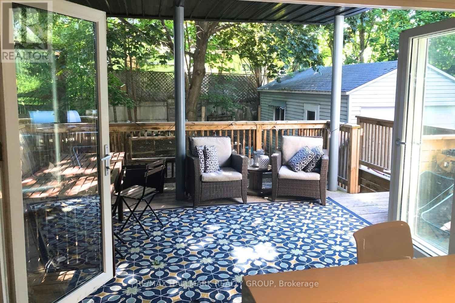 Kitchen opens seamlessly to private patio - 330 Winona Avenue, Ottawa, ON - With Deck Patio Veranda With Exterior