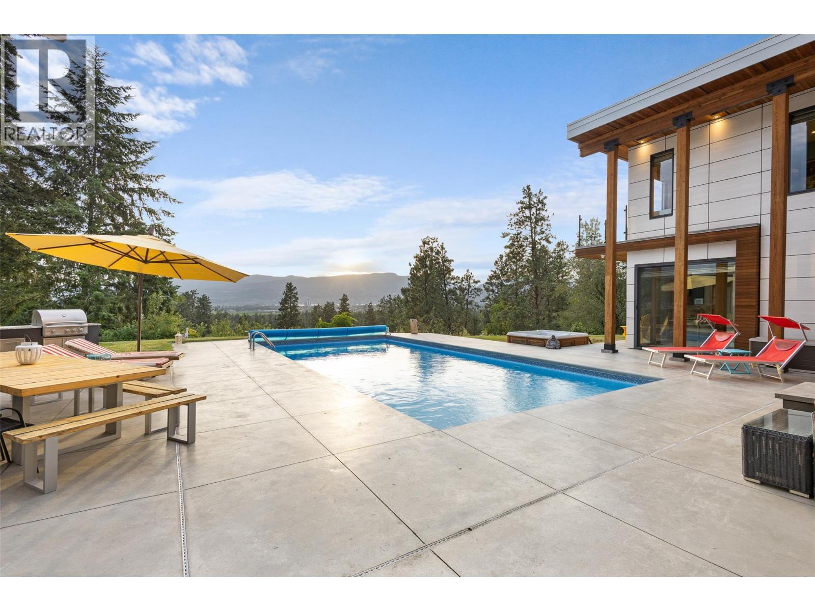 3194 Dunster Road, Kelowna, BC - Outdoor With In Ground Pool With Deck Patio Veranda