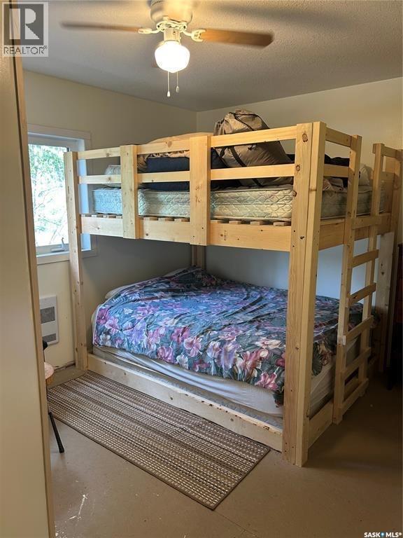 513 Tamarack Place, Northern Admin District, SK - Indoor Photo Showing Bedroom