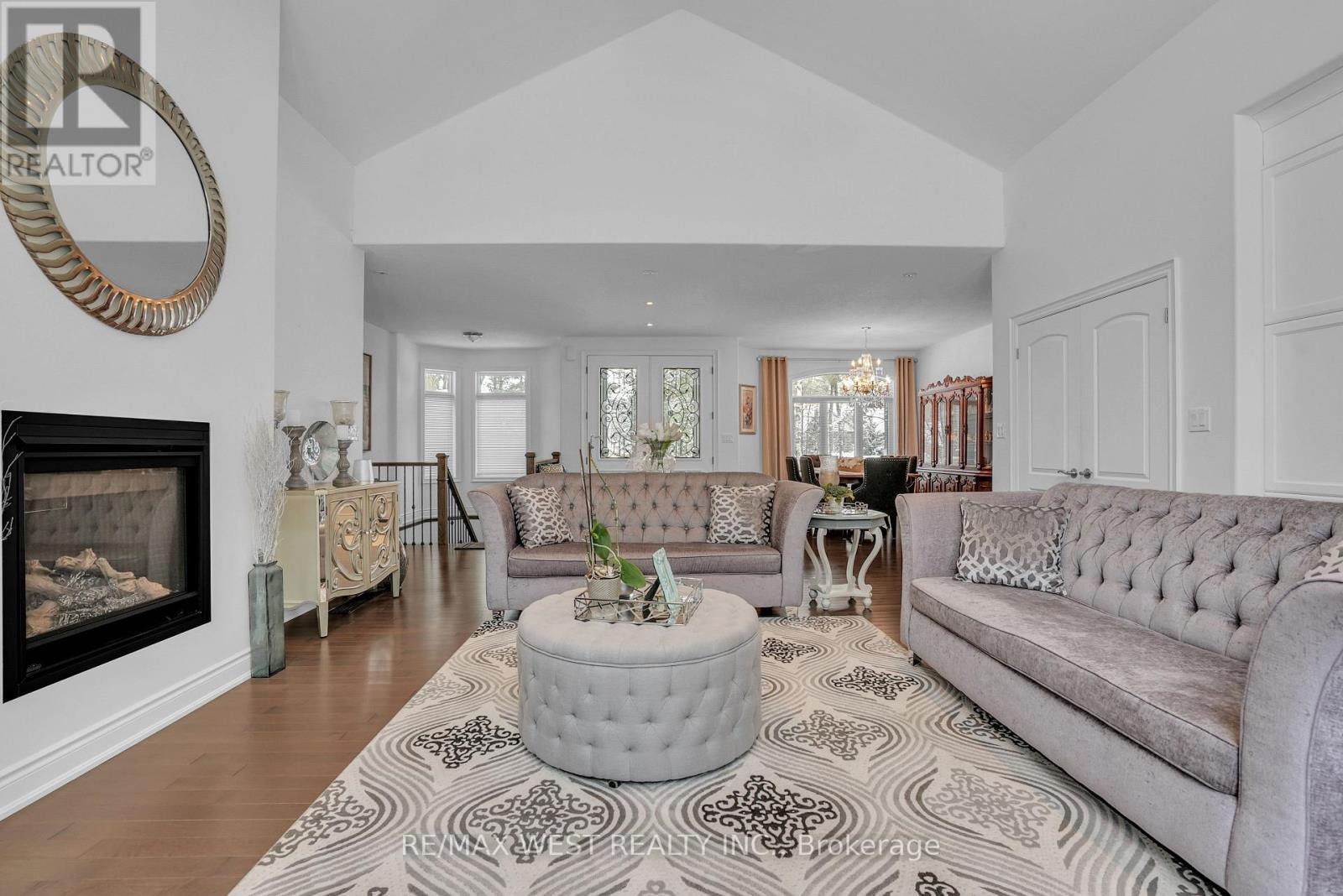 2 Sycamore Circle, Springwater, ON - Indoor Photo Showing Living Room With Fireplace