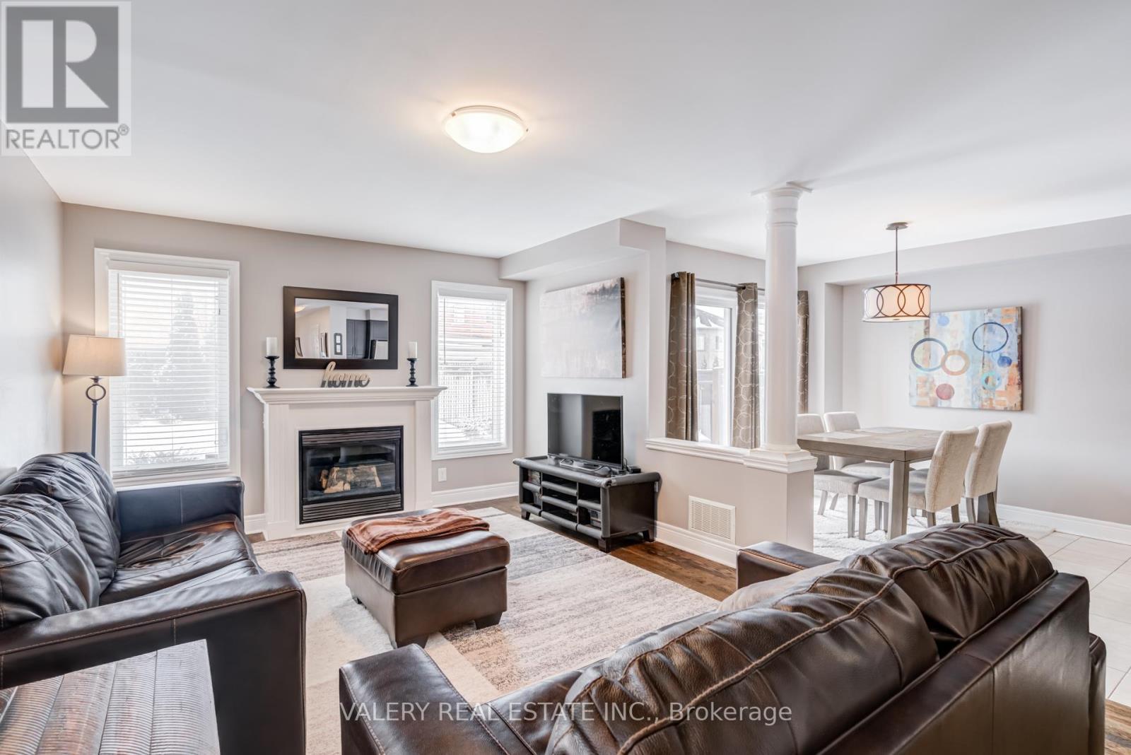 63 Bathgate Crescent, Clarington, ON - Indoor Photo Showing Living Room With Fireplace