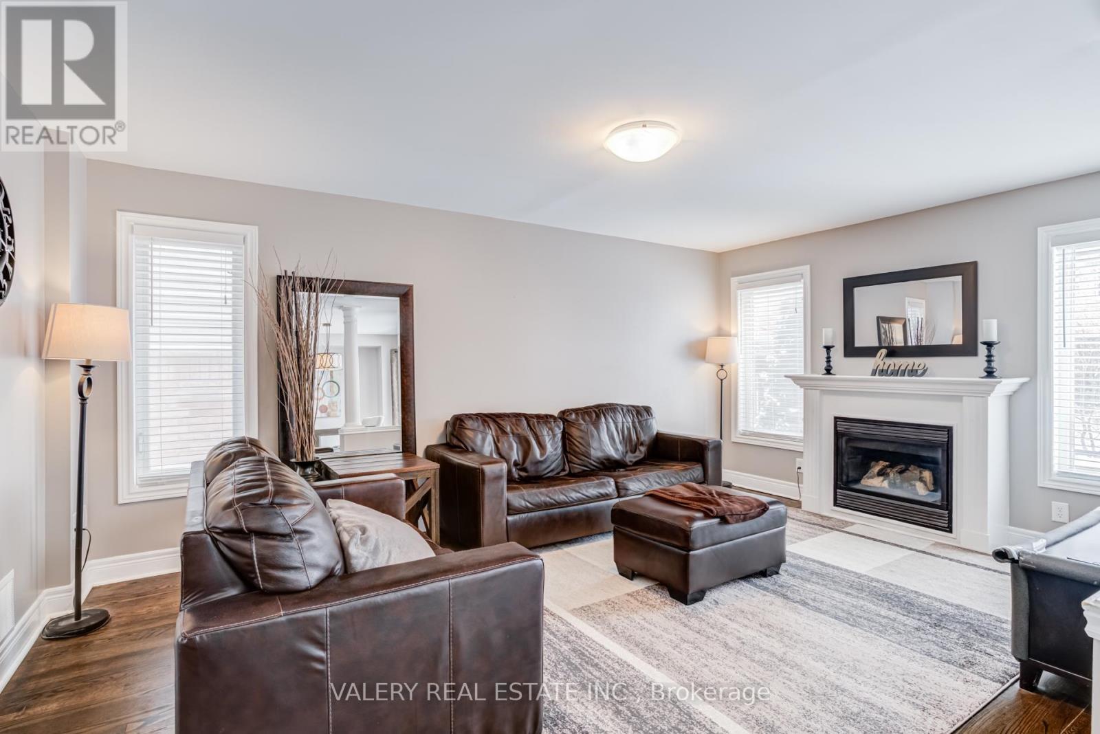 63 Bathgate Crescent, Clarington, ON - Indoor Photo Showing Living Room With Fireplace