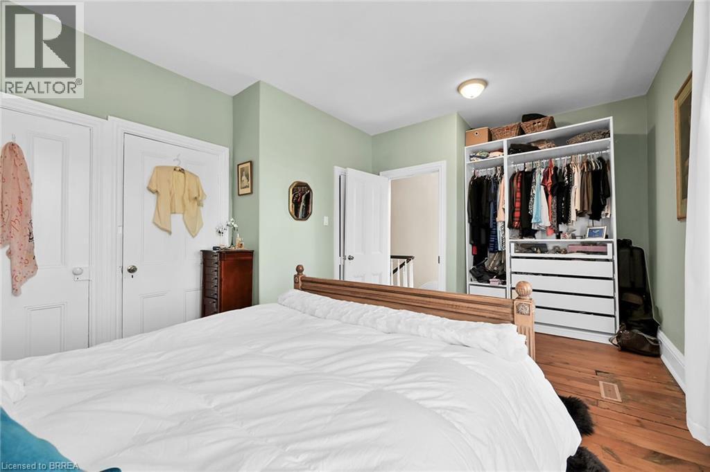 Bedroom with wood-type flooring - 40 Locke Street S, Hamilton, ON - Indoor Photo Showing Bedroom