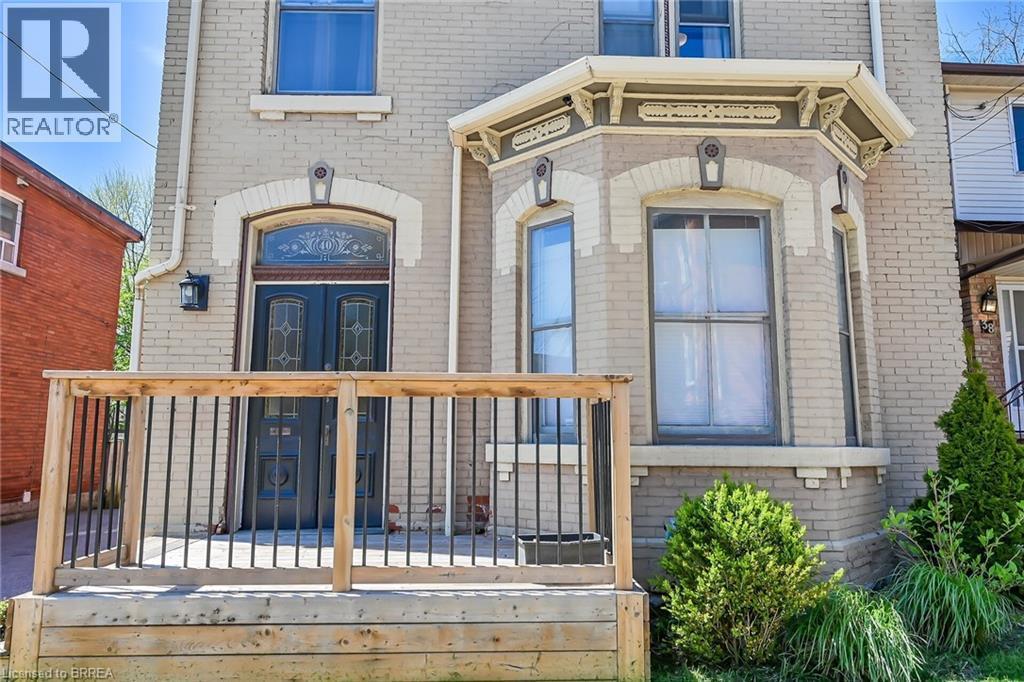 Doorway to property with covered porch - 40 Locke Street S, Hamilton, ON - Outdoor