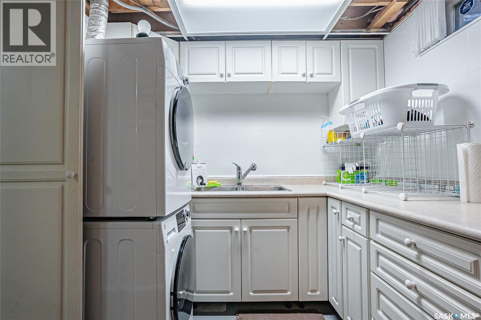 13 1128 Mckercher Drive, Saskatoon, SK - Indoor Photo Showing Laundry Room