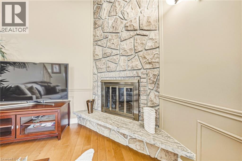 577 Tomahawk Crescent, Ancaster, ON - Indoor Photo Showing Other Room With Fireplace