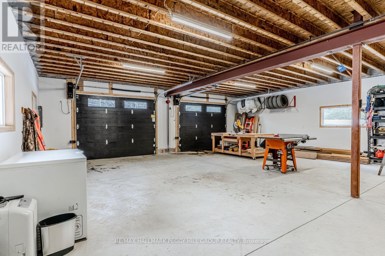 780 Marshall Road, Tiny, ON - Indoor Photo Showing Garage