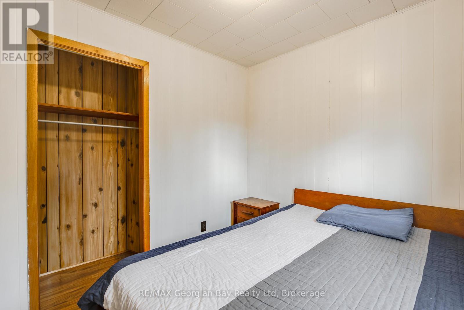 69 Albert Avenue, Tiny, ON - Indoor Photo Showing Bedroom