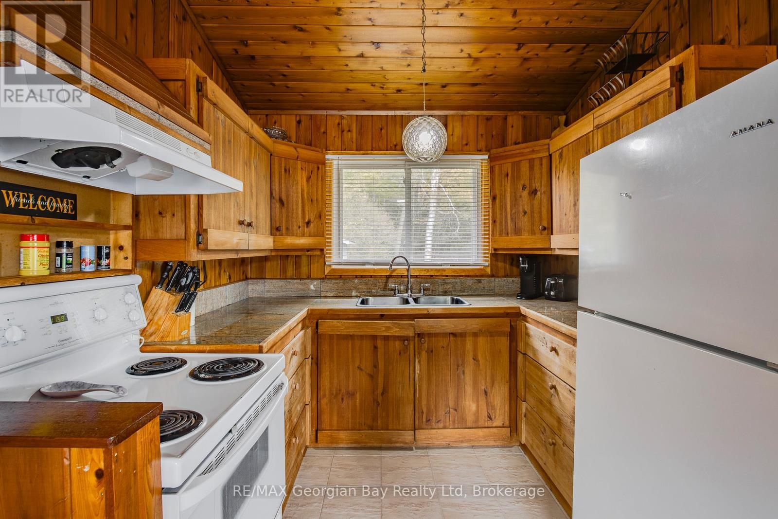 69 Albert Avenue, Tiny, ON - Indoor Photo Showing Kitchen With Double Sink