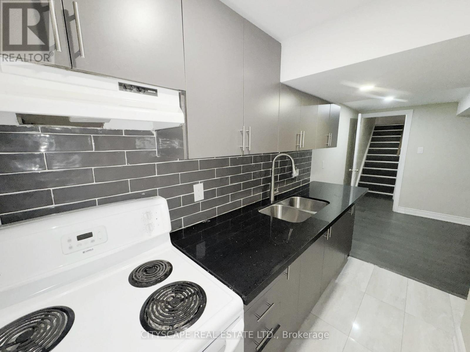 Basement Kitchen - 3970 Arbourview Terrace, Mississauga, ON - Indoor Photo Showing Kitchen With Double Sink