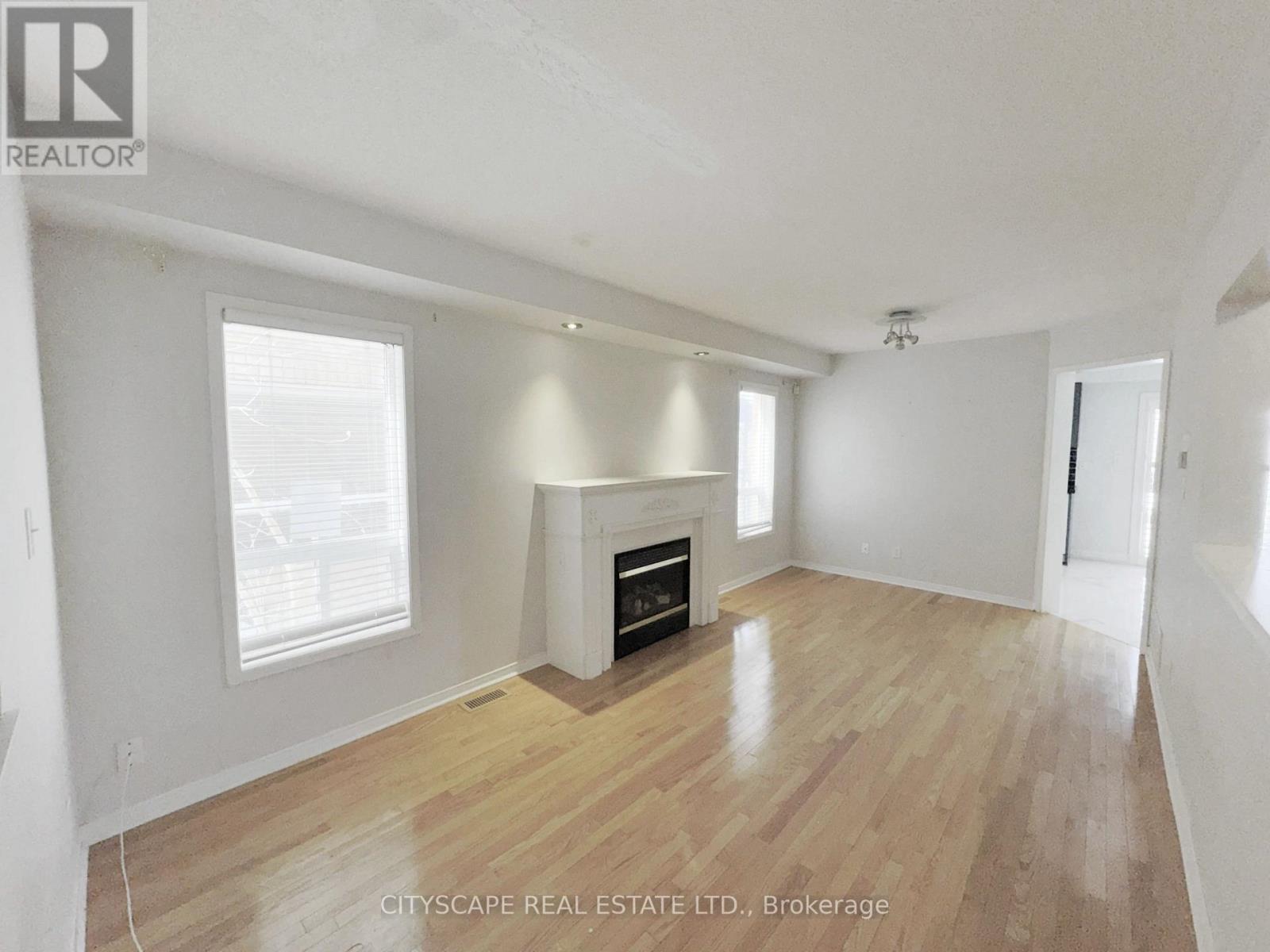 Living/Dining (Combined) - 3970 Arbourview Terrace, Mississauga, ON - Indoor With Fireplace