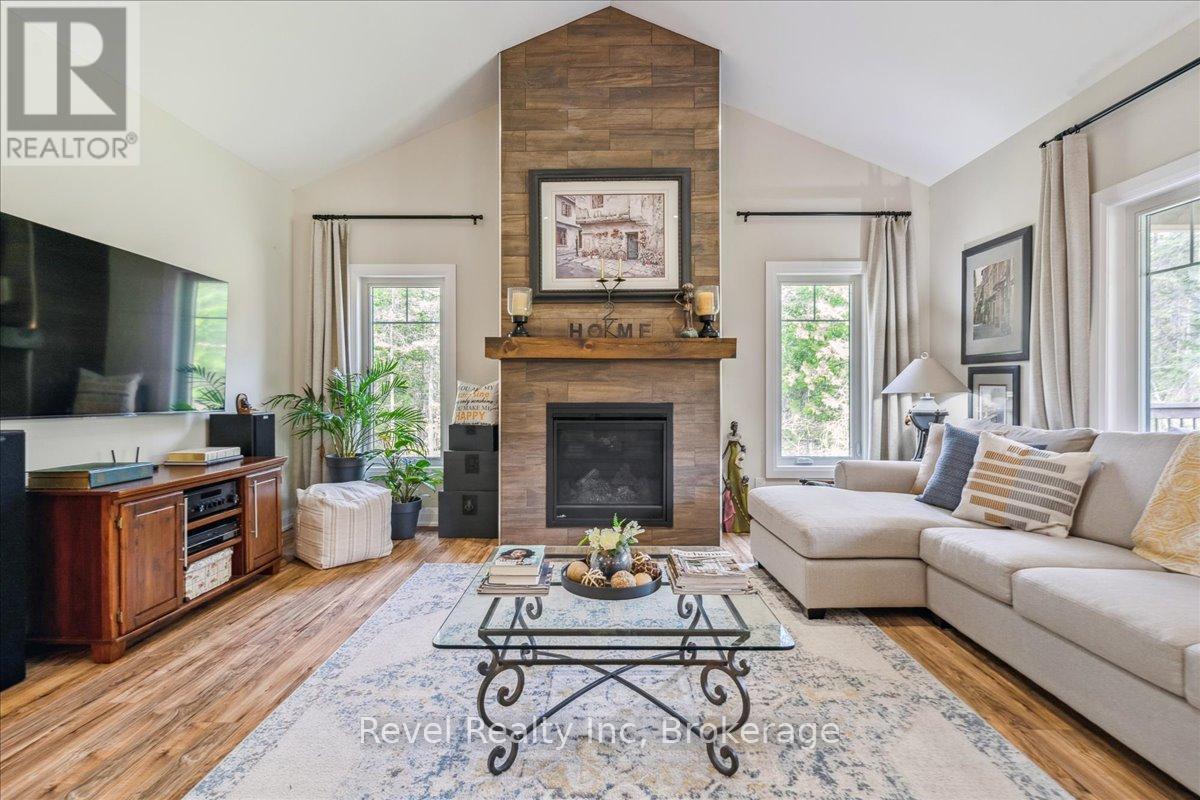 59 Trout Lane, Tiny, ON - Indoor Photo Showing Living Room With Fireplace