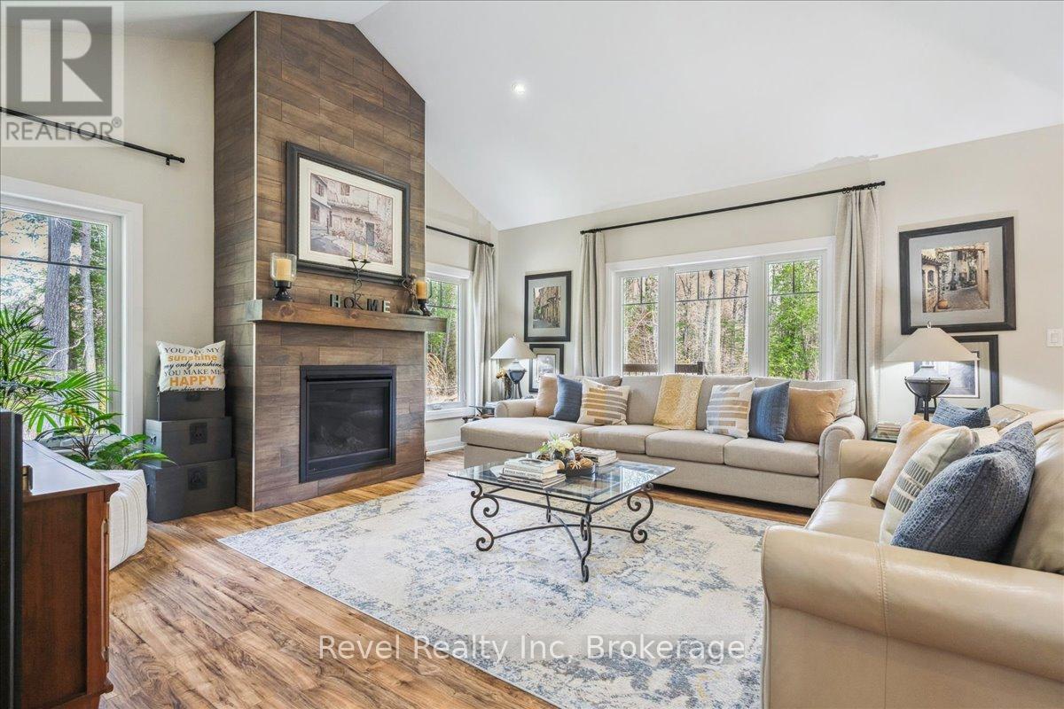 59 Trout Lane, Tiny, ON - Indoor Photo Showing Living Room With Fireplace