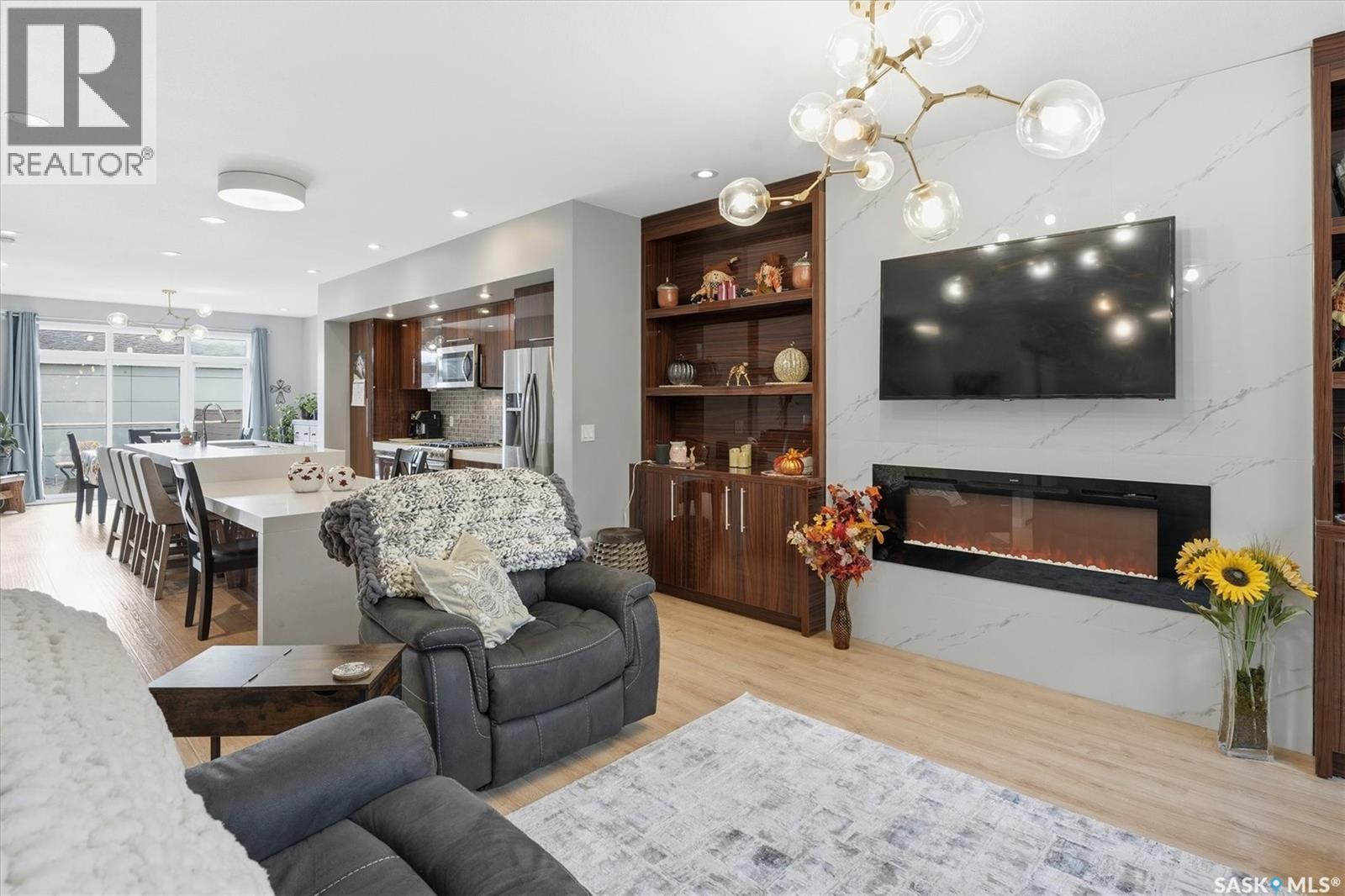1106 7Th Street E, Saskatoon, SK - Indoor Photo Showing Living Room With Fireplace