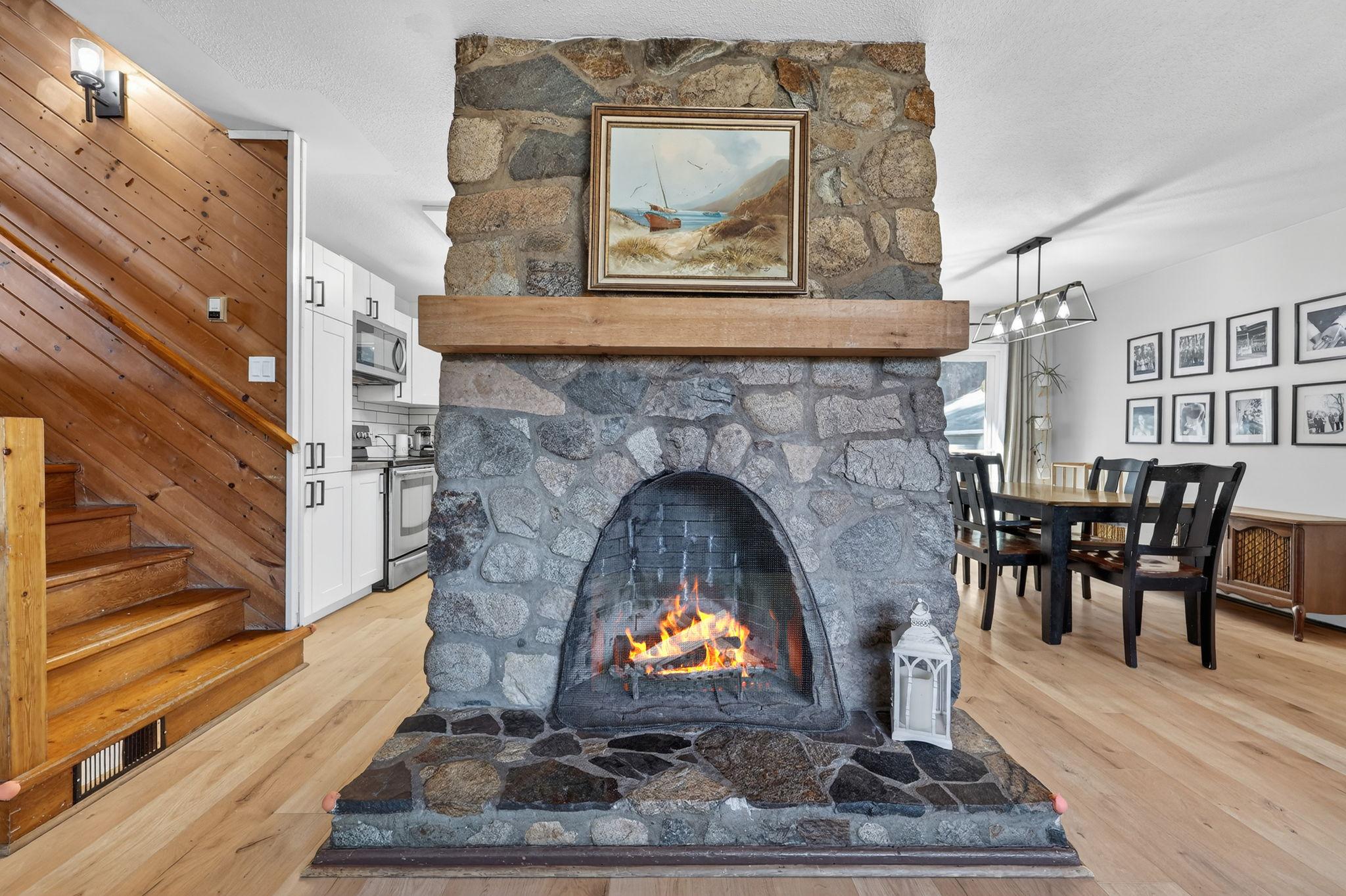 7312 Fintry Delta Road, Kelowna, BC - Indoor Photo Showing Other Room With Fireplace