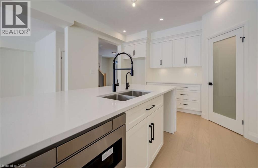 67 Crosswinds Drive, Kitchener, ON - Indoor Photo Showing Kitchen With Double Sink With Upgraded Kitchen