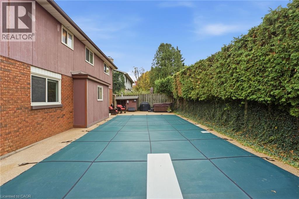 Pool view - 668 Tomahawk Crescent, Ancaster, ON - Outdoor With In Ground Pool