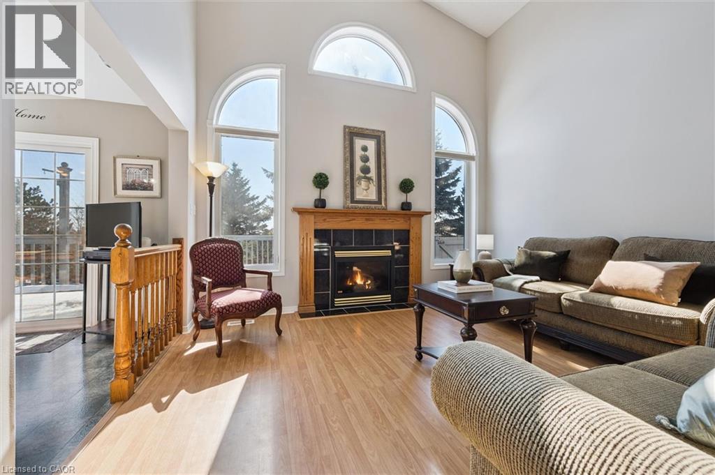 663 Heathcliffe Place, Waterloo, ON - Indoor Photo Showing Living Room With Fireplace