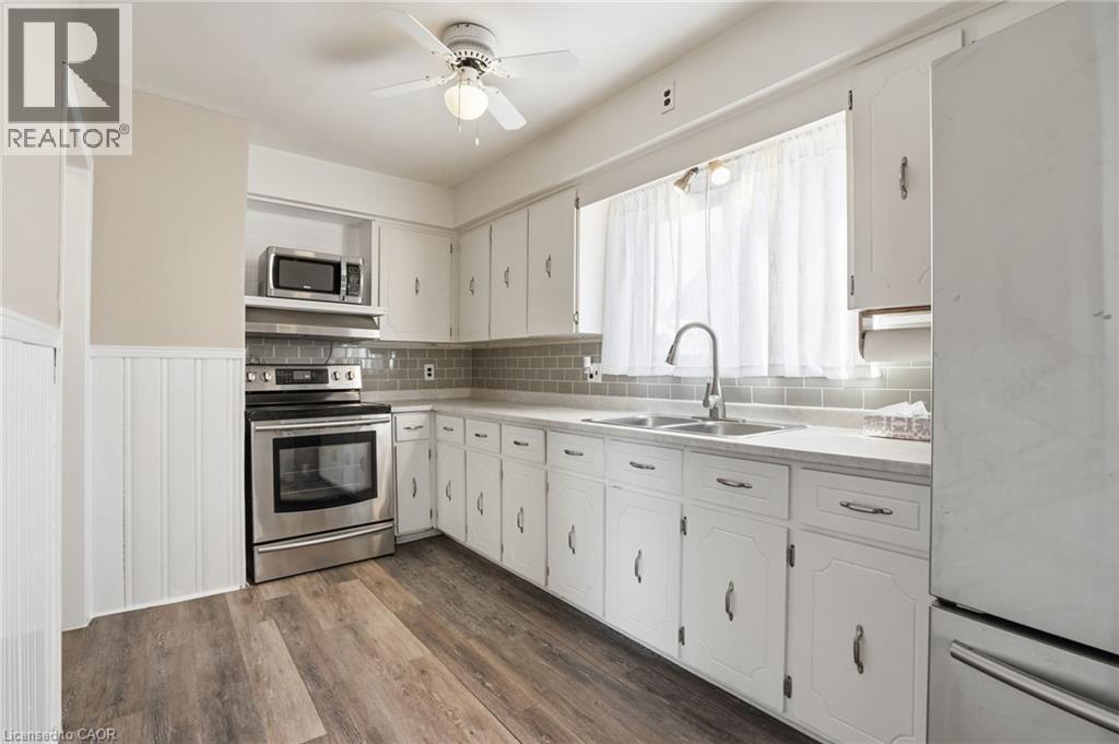 176 Adair Avenue N, Hamilton, ON - Indoor Photo Showing Kitchen With Double Sink