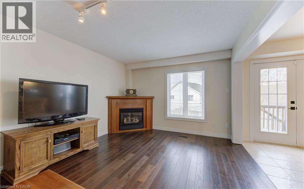 168 Bridgewater Crescent, Waterloo, ON - Indoor Photo Showing Living Room With Fireplace