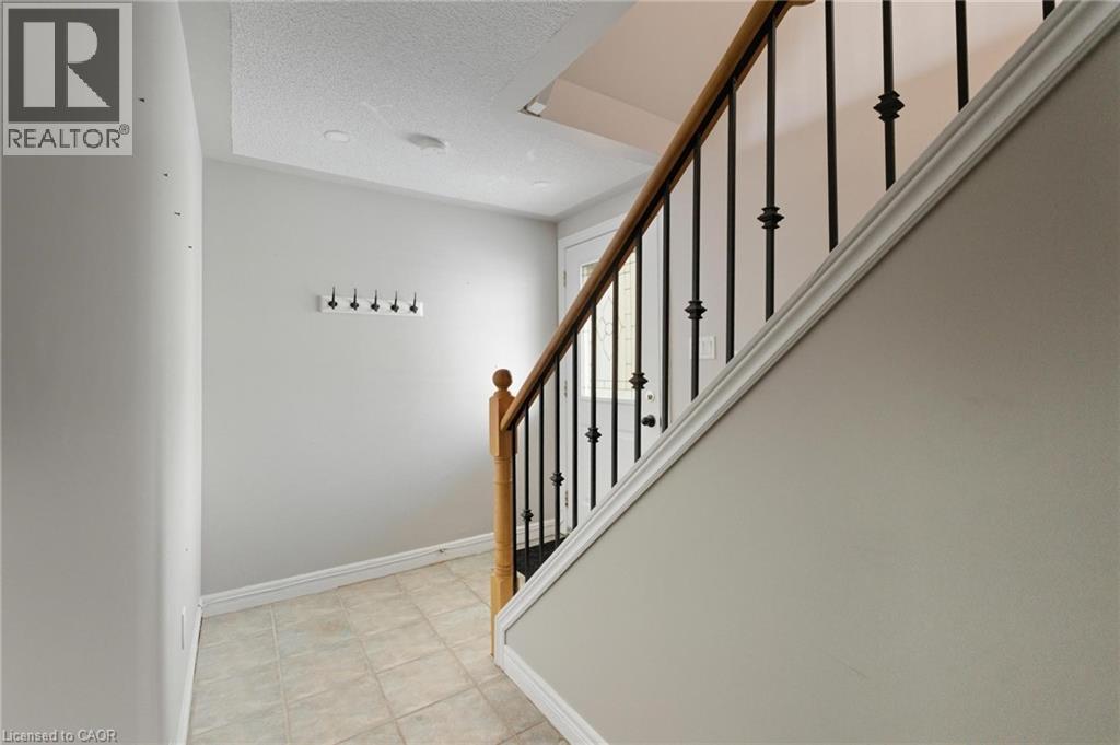 Lower level entry leading to main level - 100 Beddoe Drive Unit# 25, Hamilton, ON - Indoor Photo Showing Other Room
