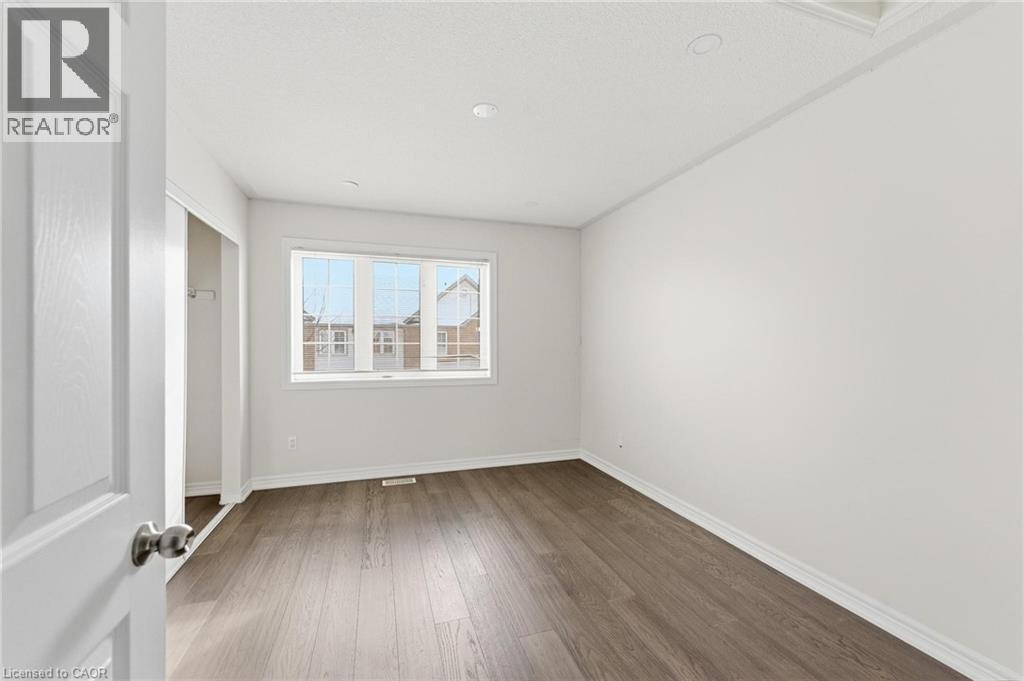 Unfurnished bedroom carpet free - 100 Beddoe Drive Unit# 25, Hamilton, ON - Indoor Photo Showing Other Room