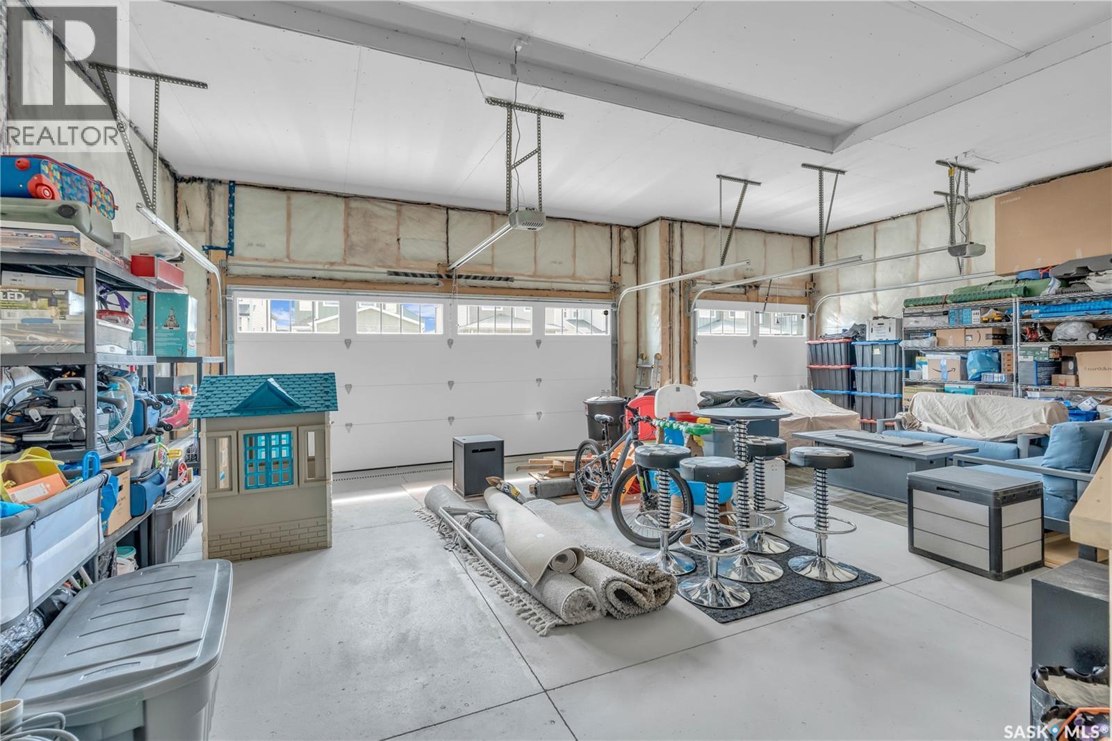 319 Dziadyk Bend, Saskatoon, SK - Indoor Photo Showing Garage