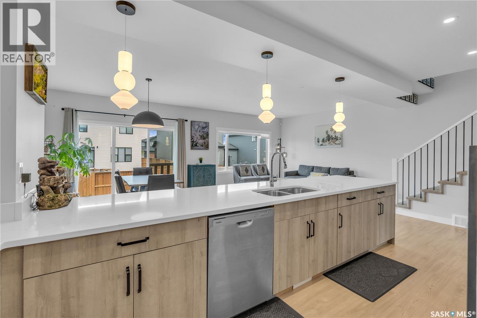 319 Dziadyk Bend, Saskatoon, SK - Indoor Photo Showing Kitchen With Double Sink