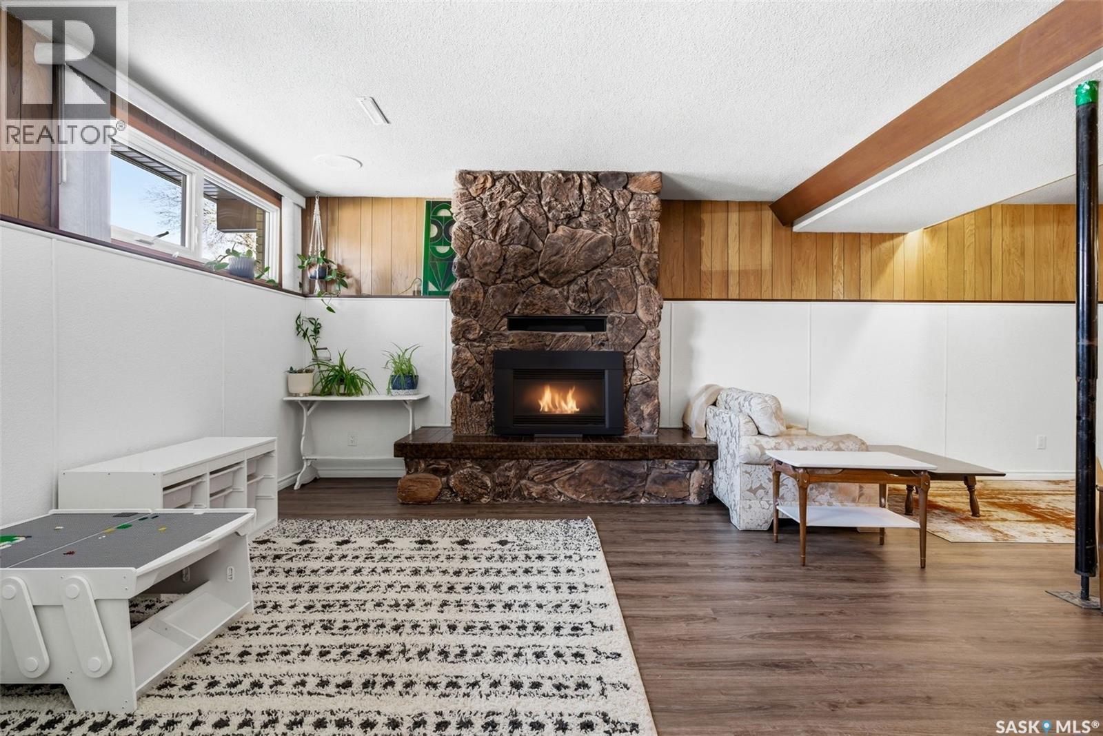 26 Mill Bay, Regina, SK - Indoor With Fireplace