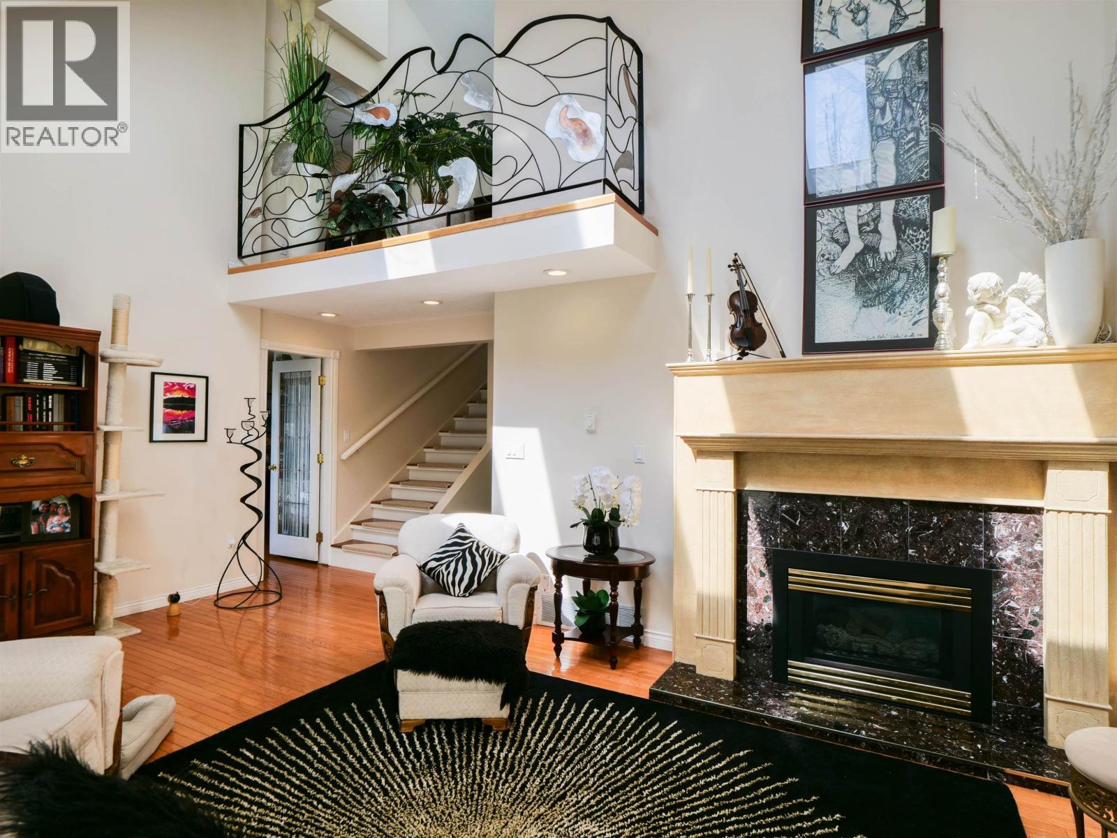 1750 Beach Crescent, Quesnel, BC - Indoor Photo Showing Living Room With Fireplace