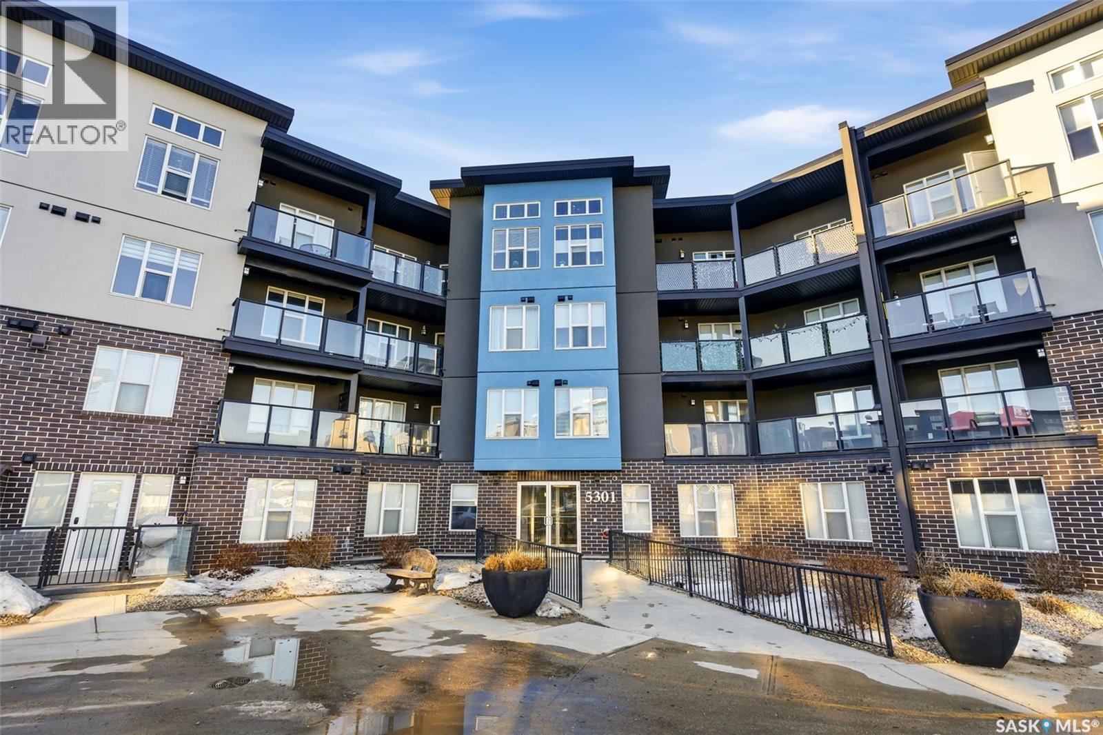 409 5301 Universal Crescent, Regina, SK - Outdoor With Balcony With Facade