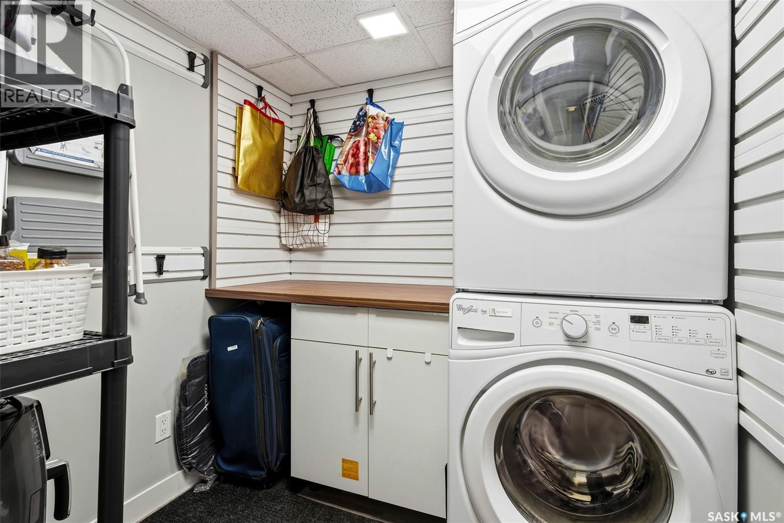 409 5301 Universal Crescent, Regina, SK - Indoor Photo Showing Laundry Room