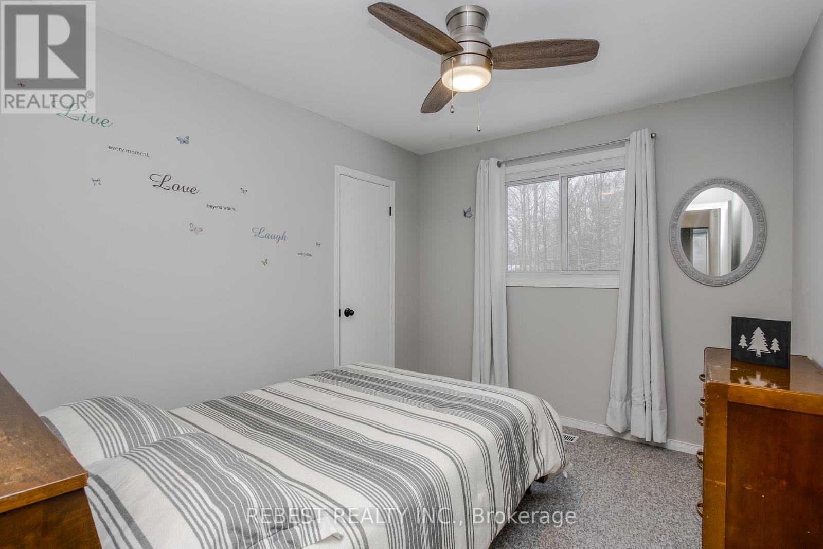 910 Concession Rd 17 W, Tiny, ON - Indoor Photo Showing Bedroom