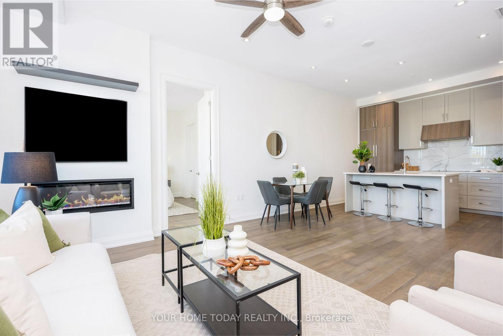 610 - 42 Mill Street, Halton Hills, ON - Indoor Photo Showing Other Room With Fireplace