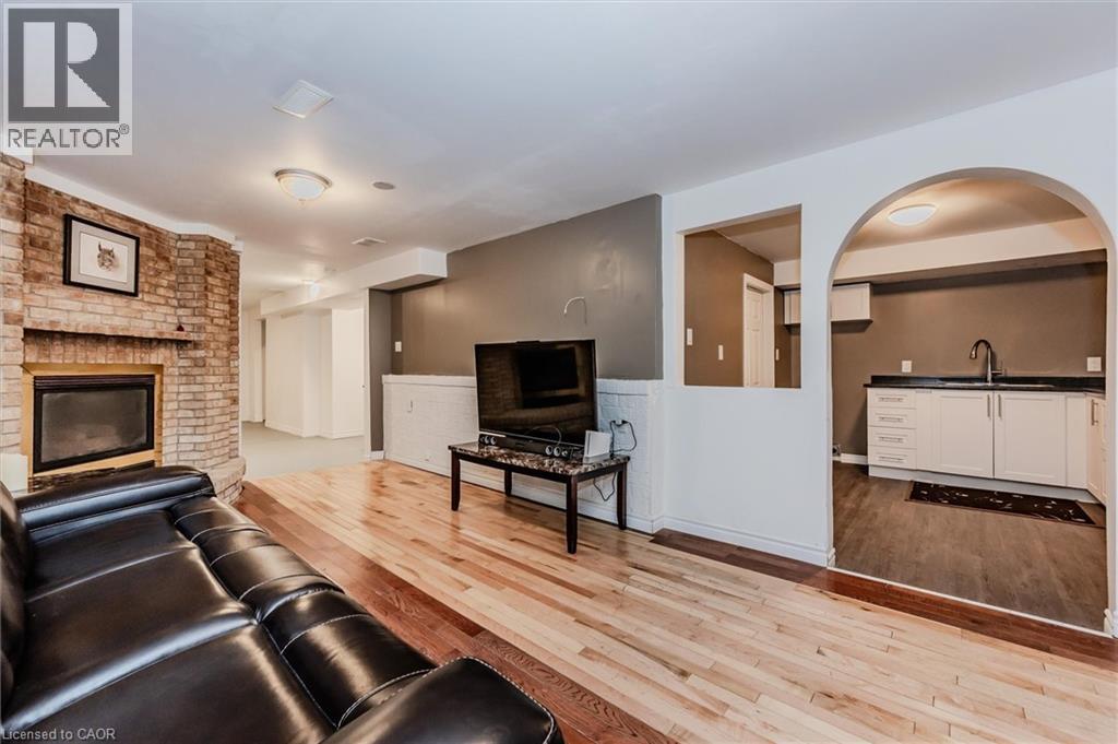46 Roberts Crescent, Kitchener, ON - Indoor Photo Showing Living Room With Fireplace