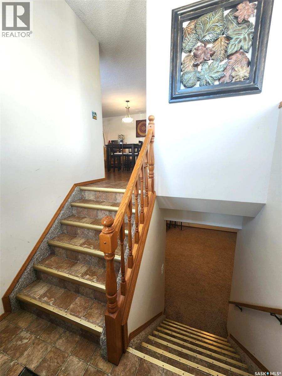 115 Carson Bay, Lampman, SK - Indoor Photo Showing Other Room