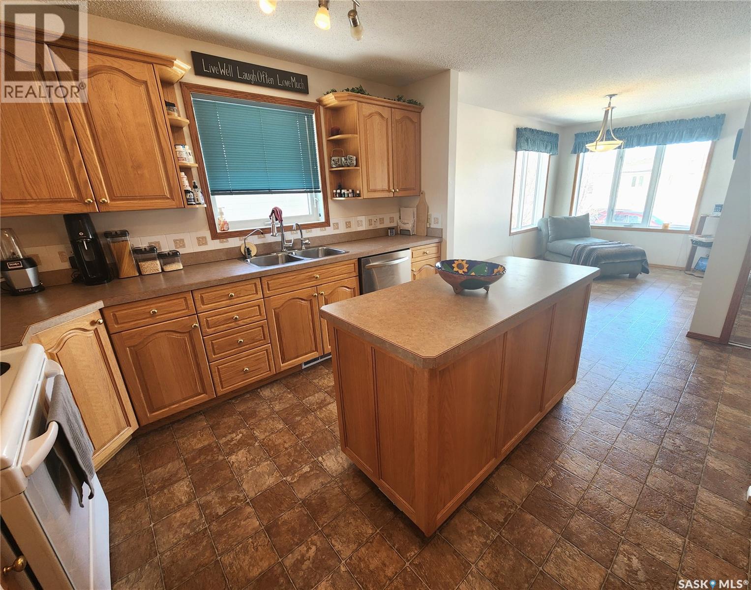 115 Carson Bay, Lampman, SK - Indoor Photo Showing Kitchen With Double Sink