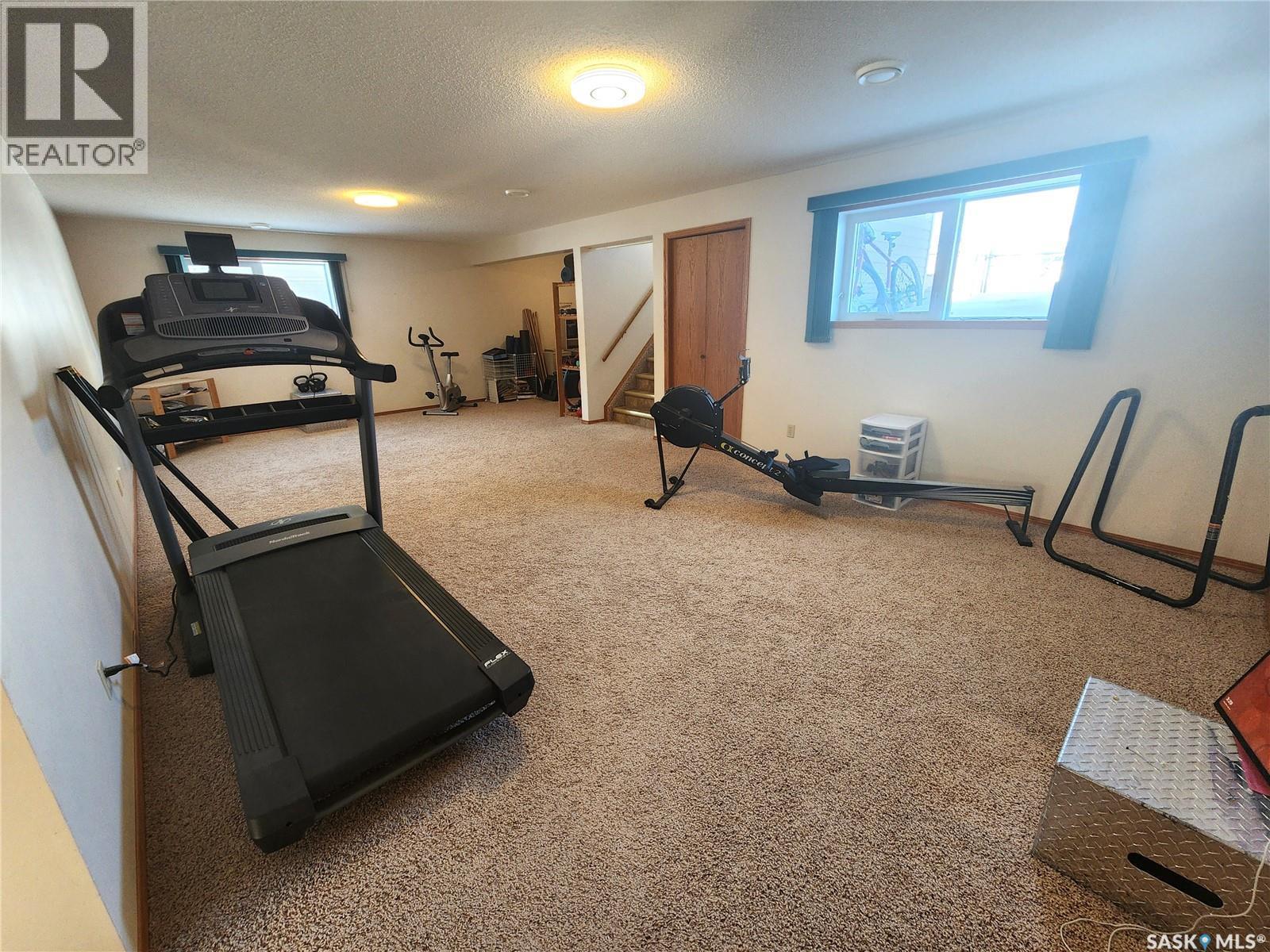 115 Carson Bay, Lampman, SK - Indoor Photo Showing Gym Room