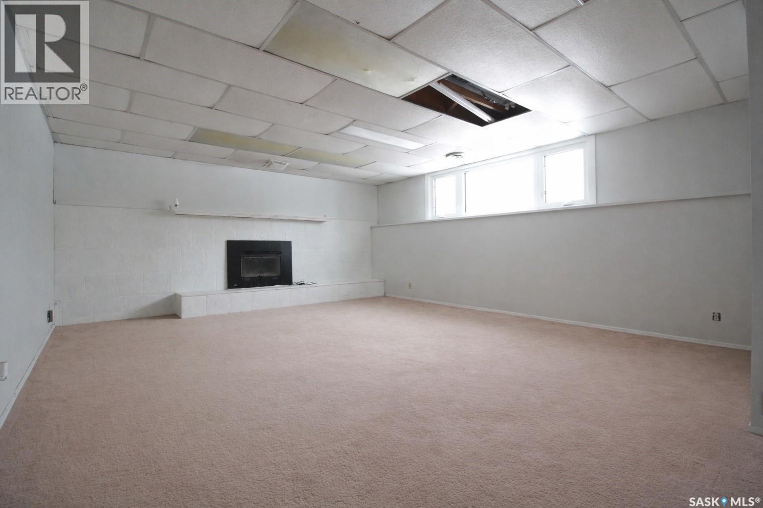 5 Souris Avenue, Redvers, SK - Indoor With Fireplace