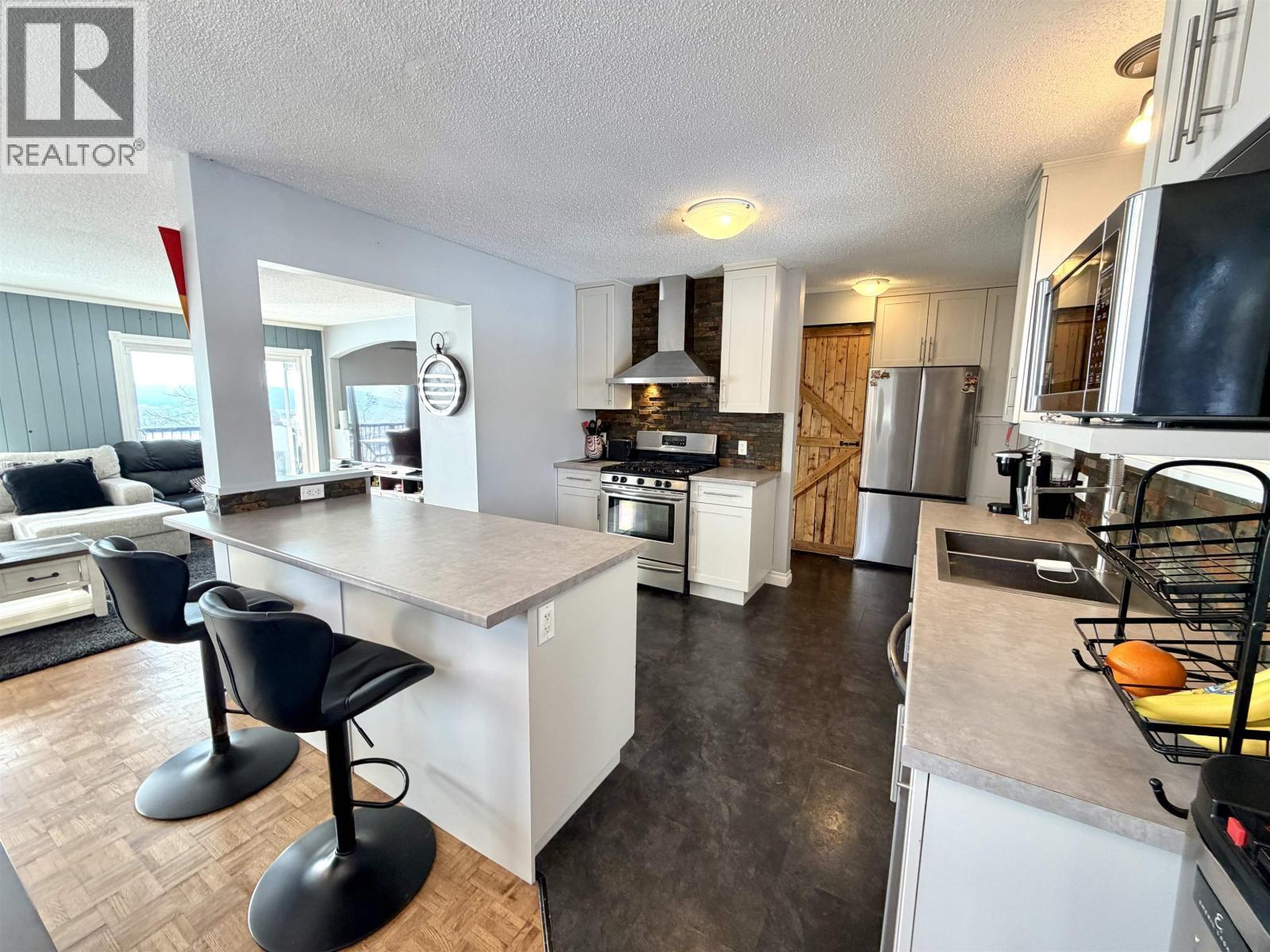 864 Old Loop Road, Vanderhoof, BC - Indoor Photo Showing Kitchen With Double Sink