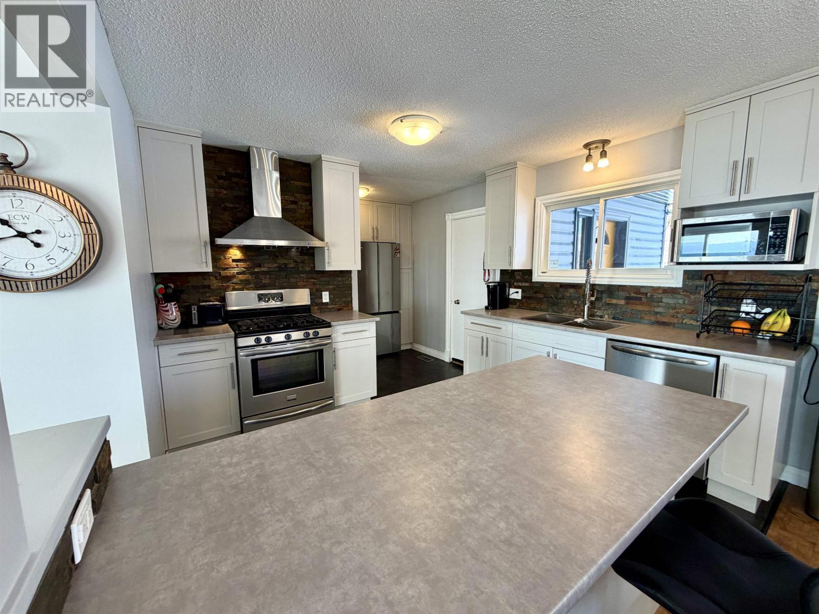864 Old Loop Road, Vanderhoof, BC - Indoor Photo Showing Kitchen With Double Sink