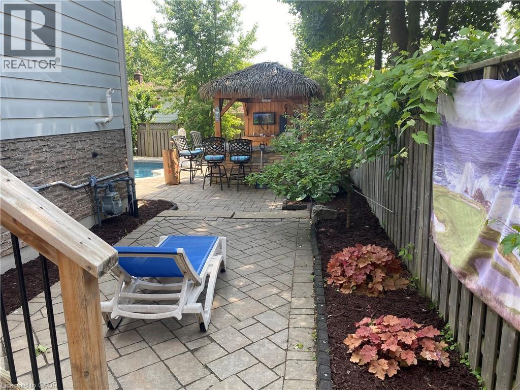 Fenced backyard featuring a patio area and outdoor dining area - 3354 Bristol Drive, Burlington, ON - Outdoor With Deck Patio Veranda